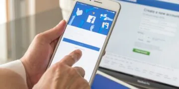 Photo Showing Person Signing Into Facebook